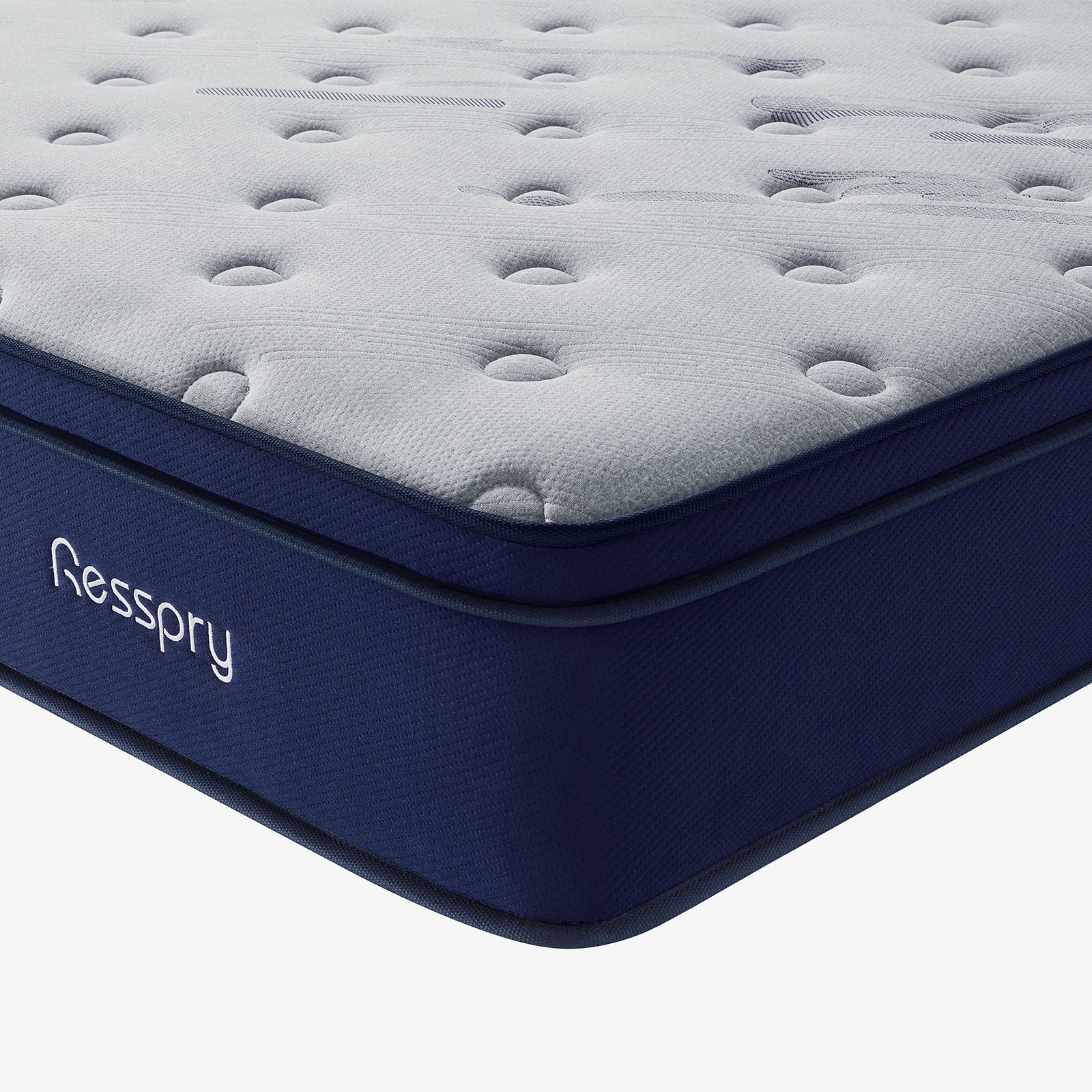 Close-up of a mattress with 'Resspry' branding on a white background